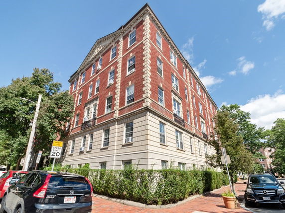 Front view of a multi-story brick building.