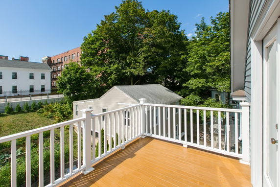 View of surrounding areas seen from a balcony.