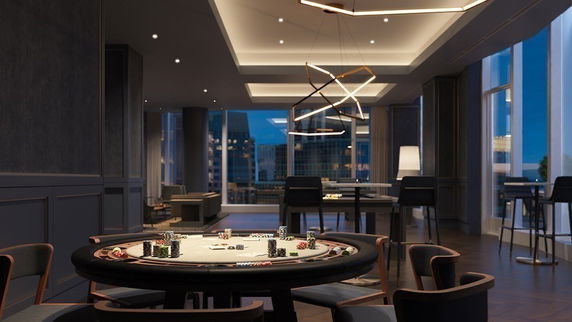 Room with a poker table and modern lighting fixtures