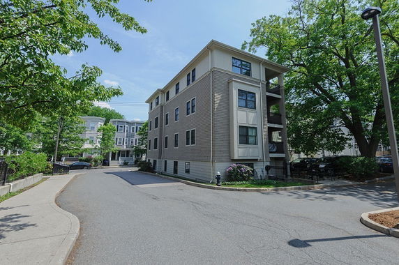 Front view of a multi-story residential building.