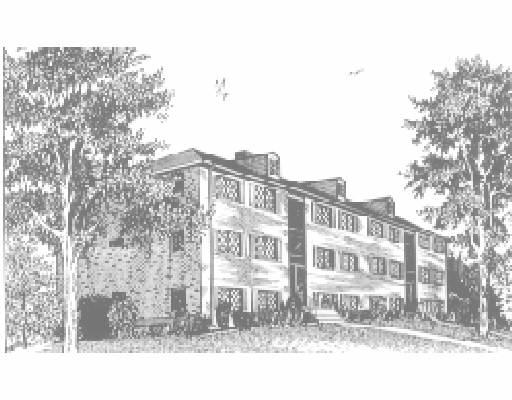 Front view of a multi-story apartment building.