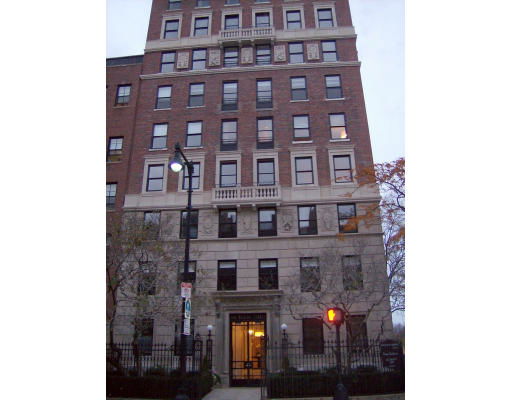 Front view of a multi-story brick building.