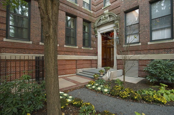 Front view of a multi-story brick building entrance