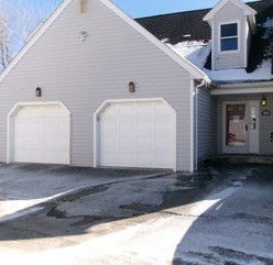 Front view of a house with a double garage.