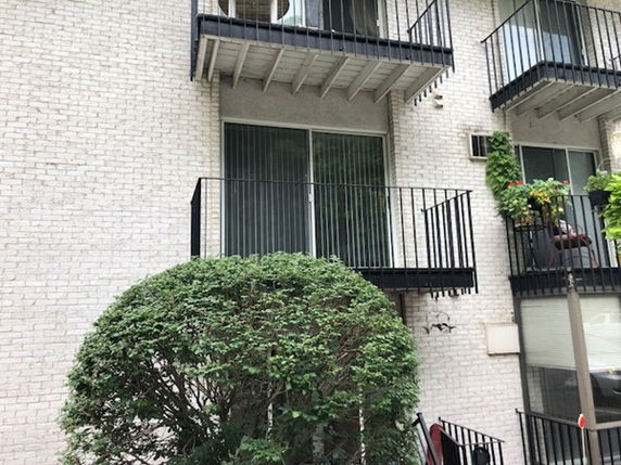 Exterior view of a building with balconies.