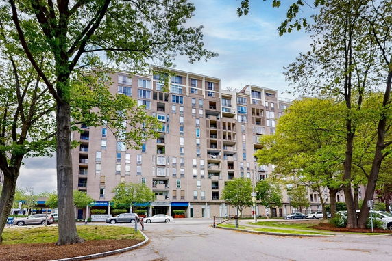 Front view of a multi-story apartment building.