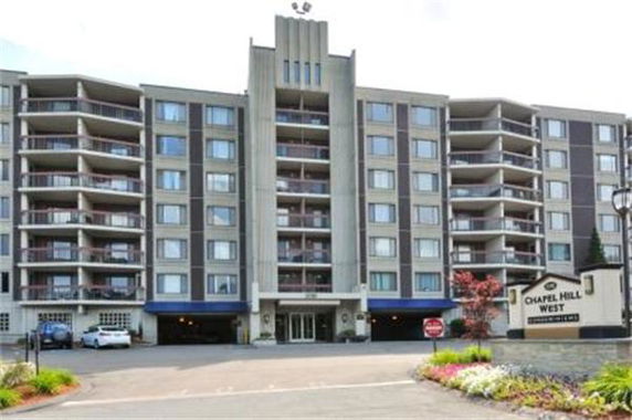 Front view of a multi-story apartment building.