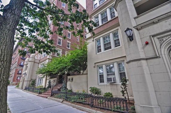 Front view of a multi-story residential building.