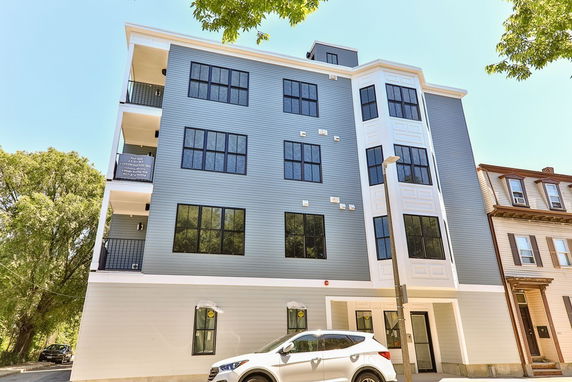 Front view of a multi-story residential building.