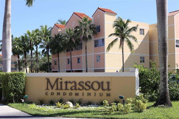 Front view of a multi-story condominium building.
