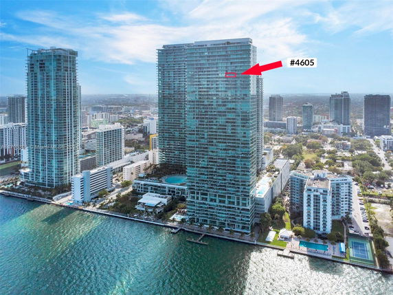Aerial view of high-rise buildings by the waterfront.
