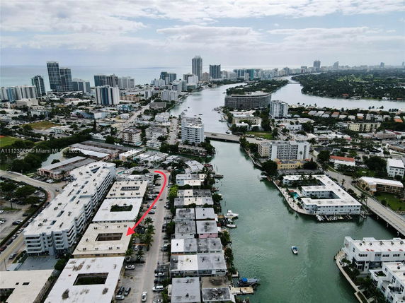 Panoramic view of buildings and waterways in an urban area.