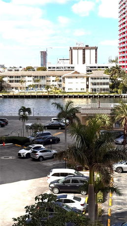 View of buildings and a river in an urban area.
