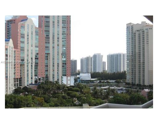 View of several high-rise apartment buildings in an urban setting.
