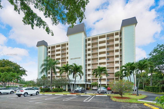 Front view of a multi-story residential building named Briarwood.