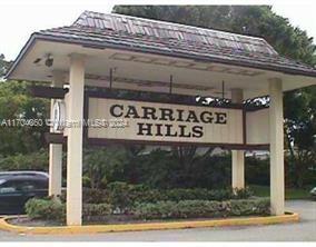 Signage for Carriage Hills at the entrance of the property.