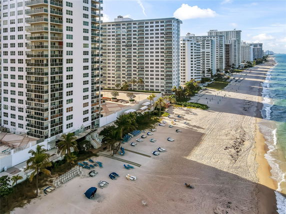 View of beachfront high-rise buildings along the coastline.