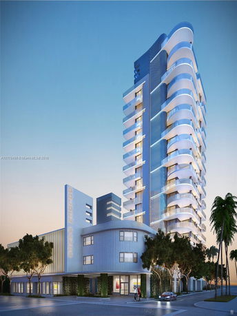 Front view of a modern high-rise building with a curved design.