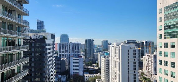 View of multiple high-rise buildings in an urban area.