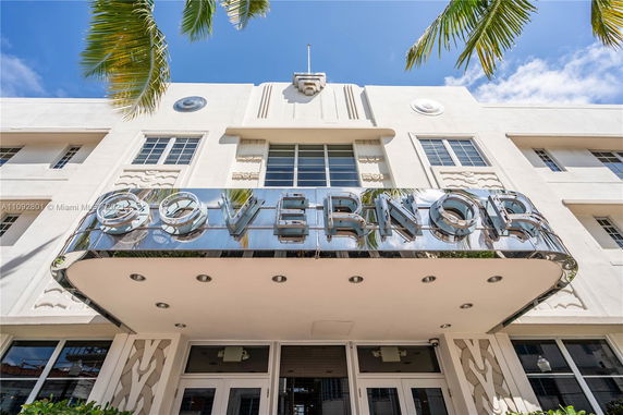 Front view of a building with Art Deco architecture and 'Governor' signage.