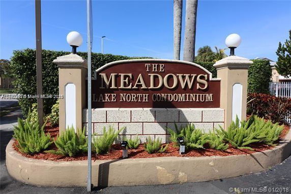 Entrance sign for The Meadows Lake North Condominium.