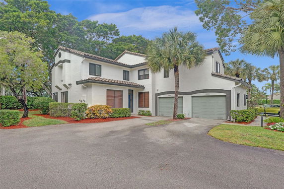 Front view of a two-story house with a two-car garage.