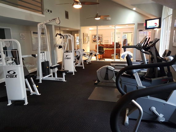 Indoor gym area with exercise equipment.