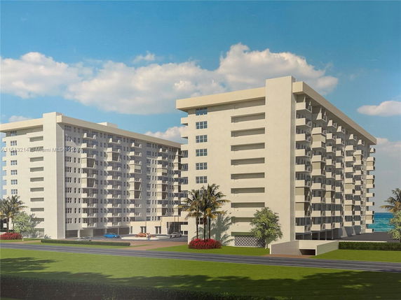 Front view of a multi-story residential building with balconies.