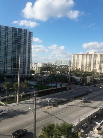 View of high-rise buildings in an urban area with a clear sky.