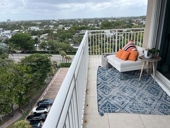 Panoramic view from a balcony overlooking a residential area.