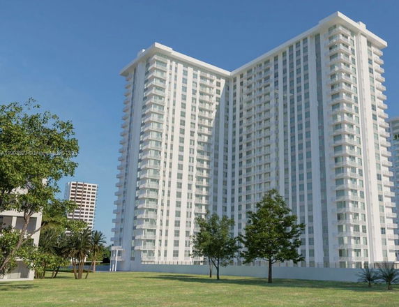 Front view of a high-rise residential building.