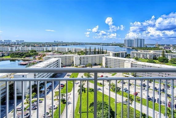 View of several multi-story residential buildings and waterways from a higher vantage point.