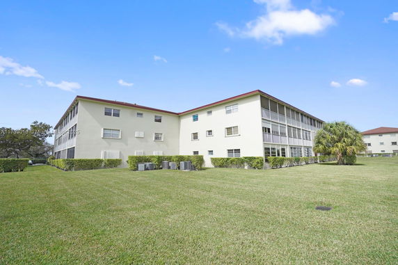 Front view of a multi-story apartment building.