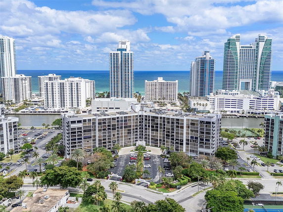 High-rise buildings near the ocean with a clear view of surrounding areas.