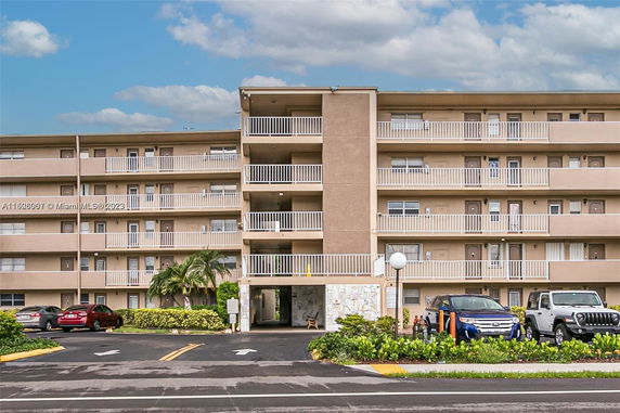 Front view of a multi-story apartment building.