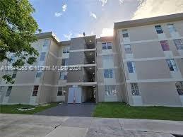 Front view of a multi-story apartment building.