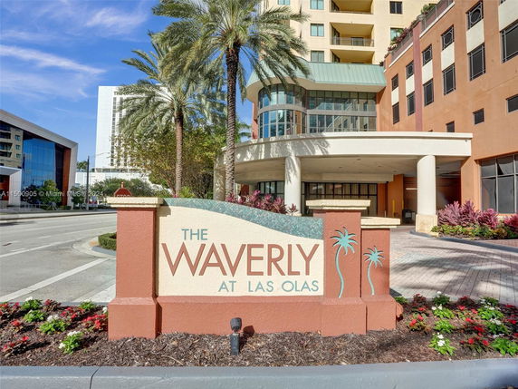 Front view of a multi-story building with a signage reading 'The Waverly at Las Olas'.