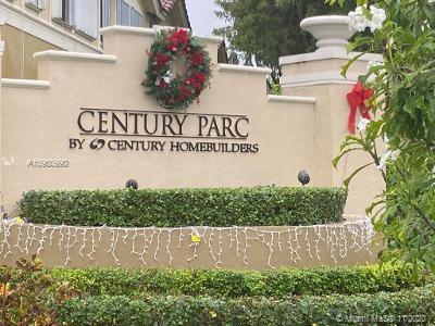 Front view of a building with a decorated entrance sign reading 'Century Parc by Century Homebuilders'.