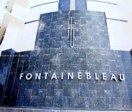 Front view of a building with the name 'Fontainebleau' displayed on a stone facade.
