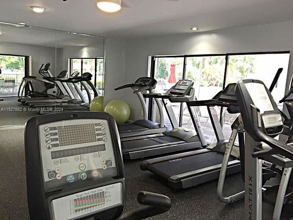 Indoor gym area with treadmills and exercise equipment.