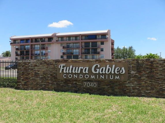Front view of a multi-story condominium building named Futura Gables.