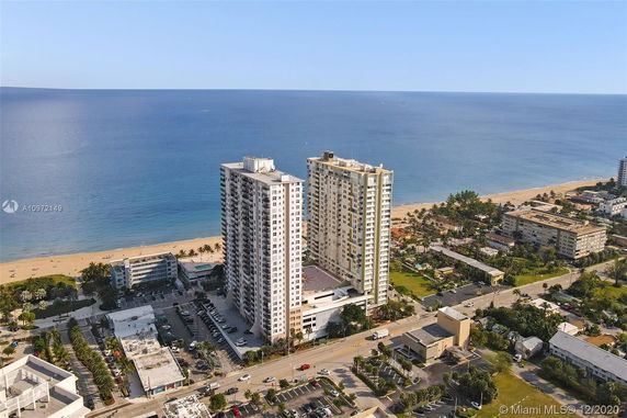 Panoramic view of high-rise buildings near a beach.