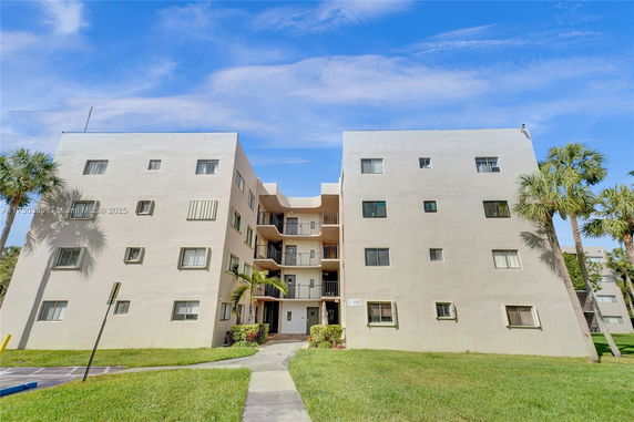 Front view of a multi-story apartment building.