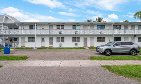 Front view of a two-story apartment building.