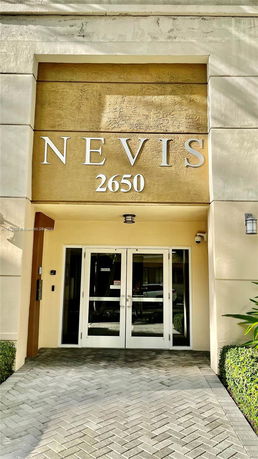 Front view of a building entrance labeled 'NEVIS 2650'.