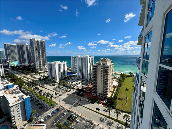 Panoramic view of high-rise buildings near the ocean.