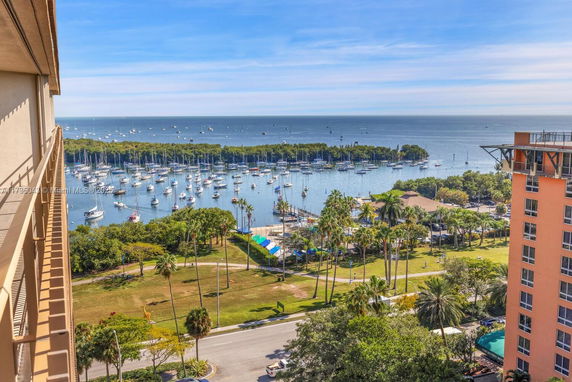 View of a waterfront area and boats from a building.