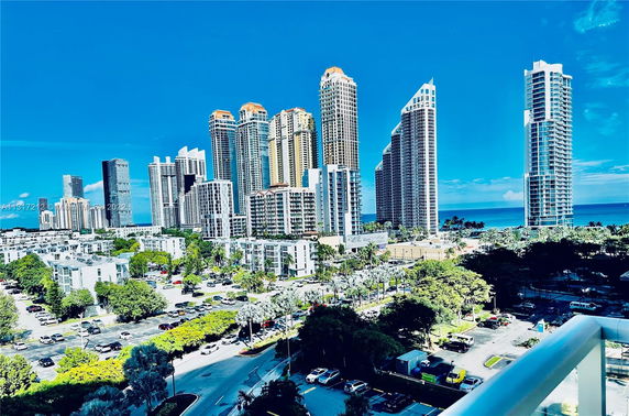 Panoramic view of skyscrapers with ocean in background