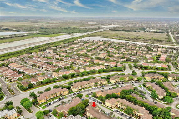 Panoramic view of a residential neighborhood with houses and streets visible.
