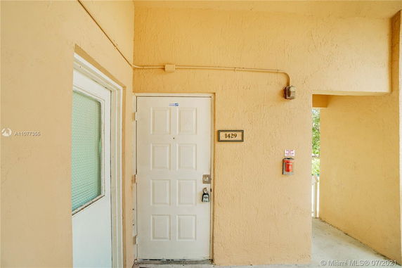 Front view of an exterior door with house number 1429.